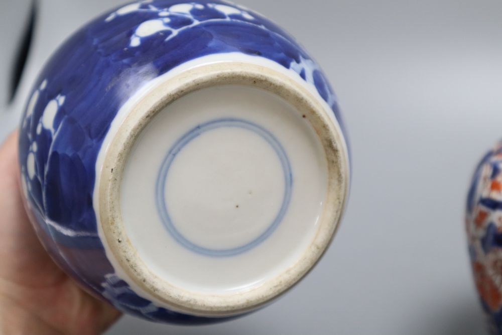 A blue and white Chinese dragon jar, an Imari jar and a blue and white lidded Prunus jar, tallest 17.5cm